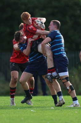 011025 - Ysgol Gyfun Gymraeg Glantaf v Coleg Gwent, WRU Welsh Schools & Colleges league - Ellis Anderson of Coleg Gwent is tackled