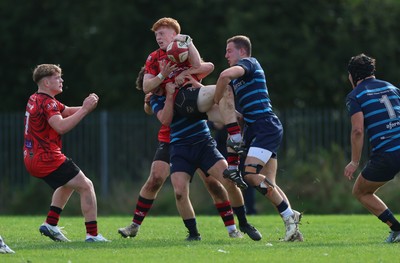 011025 - Ysgol Gyfun Gymraeg Glantaf v Coleg Gwent, WRU Welsh Schools & Colleges league - Ellis Anderson of Coleg Gwent is tackled