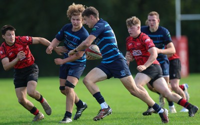 011025 - Ysgol Gyfun Gymraeg Glantaf v Coleg Gwent, WRU Welsh Schools & Colleges league - Will Adams of Ysgol Glantaf races away
