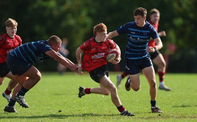 011025 - Ysgol Gyfun Gymraeg Glantaf v Coleg Gwent, WRU Welsh Schools & Colleges league - Ellis Anderson of Coleg Gwent takes on Isaac Jones of Ysgol Glantaf