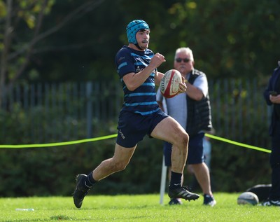 011025 - Ysgol Gyfun Gymraeg Glantaf v Coleg Gwent, WRU Welsh Schools & Colleges league - Harry Kinsey of Ysgol Glantaf races away