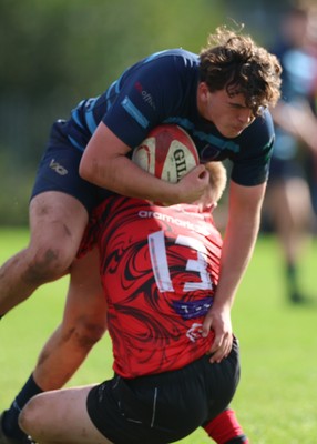 011025 - Ysgol Gyfun Gymraeg Glantaf v Coleg Gwent, WRU Welsh Schools & Colleges league - Efan Jenkins of Ysgol Glantaf takes on Rylie Probert of Coleg Gwent