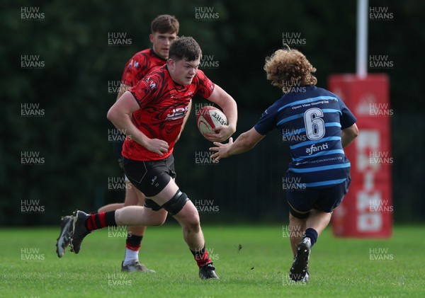 011025 - Ysgol Gyfun Gymraeg Glantaf v Coleg Gwent, WRU Welsh Schools & Colleges league - Josh Bradley of Coleg Gwent takes on Oli Roberts of Ysgol Glantaf