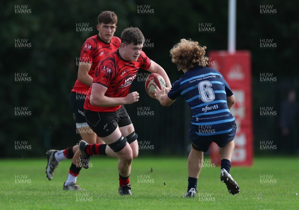 011025 - Ysgol Gyfun Gymraeg Glantaf v Coleg Gwent, WRU Welsh Schools & Colleges league - Josh Bradley of Coleg Gwent takes on Oli Roberts of Ysgol Glantaf
