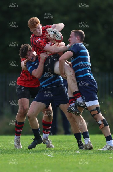 011025 - Ysgol Gyfun Gymraeg Glantaf v Coleg Gwent, WRU Welsh Schools & Colleges league - Ellis Anderson of Coleg Gwent is tackled