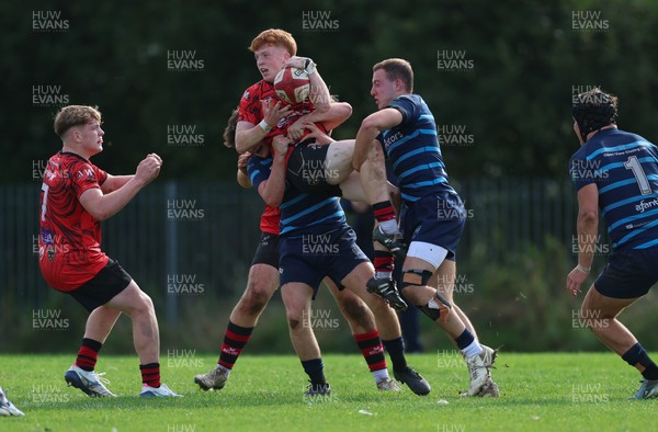 011025 - Ysgol Gyfun Gymraeg Glantaf v Coleg Gwent, WRU Welsh Schools & Colleges league - Ellis Anderson of Coleg Gwent is tackled