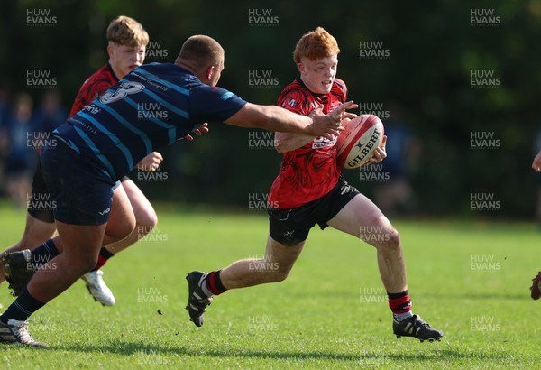 011025 - Ysgol Gyfun Gymraeg Glantaf v Coleg Gwent, WRU Welsh Schools & Colleges league - Ellis Anderson of Coleg Gwent takes on Isaac Jones of Ysgol Glantaf