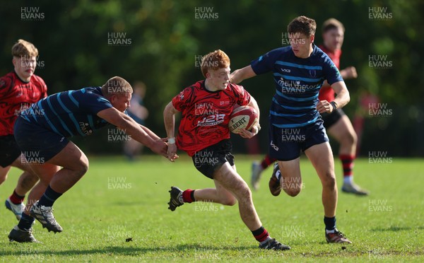011025 - Ysgol Gyfun Gymraeg Glantaf v Coleg Gwent, WRU Welsh Schools & Colleges league - Ellis Anderson of Coleg Gwent takes on Isaac Jones of Ysgol Glantaf