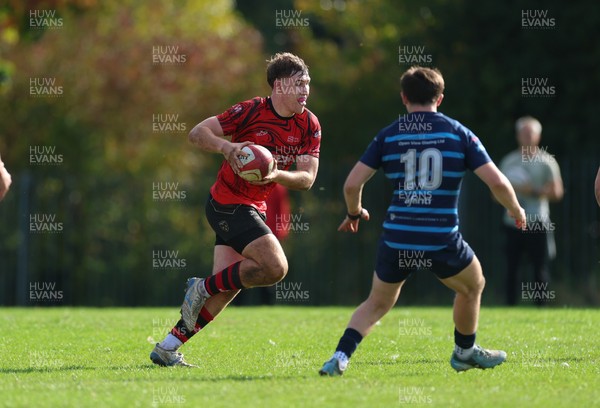 011025 - Ysgol Gyfun Gymraeg Glantaf v Coleg Gwent, WRU Welsh Schools & Colleges league - Tegwyn Mahoney of Coleg Gwent takes on Evan Jones of Ysgol Glantaf