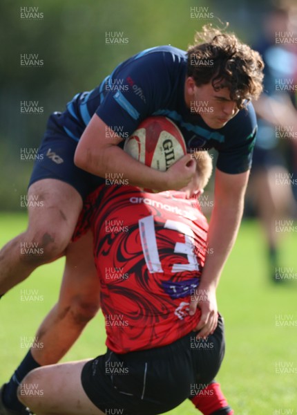 011025 - Ysgol Gyfun Gymraeg Glantaf v Coleg Gwent, WRU Welsh Schools & Colleges league - Efan Jenkins of Ysgol Glantaf takes on Rylie Probert of Coleg Gwent