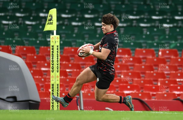 101224 - Ysgol Gyfun Bro Myrddin v Ysgol Gyfun Cwm Rhymni - WSC U18s Champion of Champions - Gwion Evans of Ysgol Gyfun Bro Myrddin scores a try