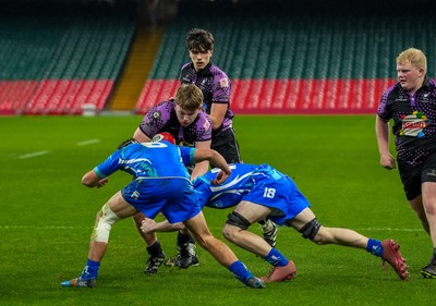 111225 - Ysgol Gymraeg Bro Morgannwg v Ysgol Gyfun Gymraeg Bro Myrddin - U18 Schools and Colleges Champions of Champions - Tomos Parry of Ysgol Gyfun Gymraeg Bro Myrddin is tackled by Alain Davies and Gethin Halsall of Ysgol Gymraeg Bro Morgannwg