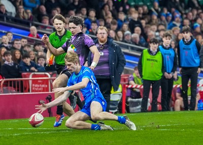 111225 - Ysgol Gymraeg Bro Morgannwg v Ysgol Gyfun Gymraeg Bro Myrddin - U18 Schools and Colleges Champions of Champions - Owain Ellis-Jones of Ysgol Gyfun Gymraeg Bro Myrddin competes for the ball against Tomos Provis of Ysgol Gymraeg Bro Morgannwg