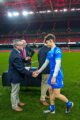 111225 - Ysgol Gymraeg Bro Morgannwg v Ysgol Gyfun Gymraeg Bro Myrddin - U18 Schools and Colleges Champions of Champions - Rhys Muxworthy is given his winners medal following