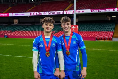 111225 - Ysgol Gymraeg Bro Morgannwg v Ysgol Gyfun Gymraeg Bro Myrddin - U18 Schools and Colleges Champions of Champions - Rhys Muxworthy  of Ysgol Gymraeg Bro Morgannwg (L) and teammate pose for a photo following 