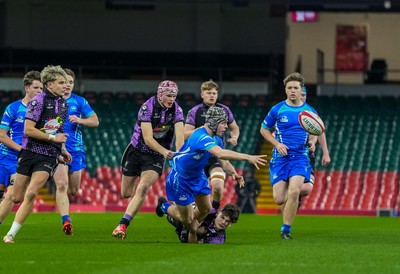 111225 - Ysgol Gymraeg Bro Morgannwg v Ysgol Gyfun Gymraeg Bro Myrddin - U18 Schools and Colleges Champions of Champions - Owen Lewis of Ysgol Gymraeg Bro Morgannwg passes the ball