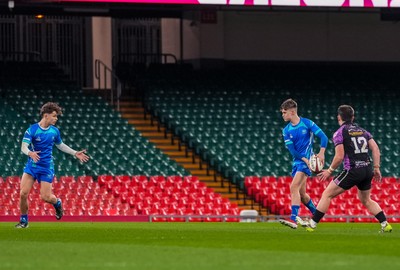 111225 - Ysgol Gymraeg Bro Morgannwg v Ysgol Gyfun Gymraeg Bro Myrddin - U18 Schools and Colleges Champions of Champions - Tomos Williams of Ysgol Gymraeg Bro Morgannwg passes the ball to teammate Rhys Muxworthy