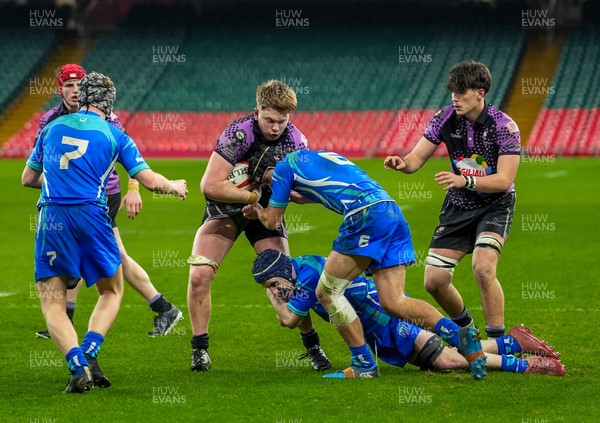111225 - Ysgol Gymraeg Bro Morgannwg v Ysgol Gyfun Gymraeg Bro Myrddin - U18 Schools and Colleges Champions of Champions - Tomos Parry of Ysgol Gyfun Gymraeg Bro Myrddin is tackled by Alain Davies and Gethin Halsall of Ysgol Gymraeg Bro Morgannwg