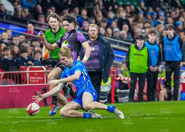111225 - Ysgol Gymraeg Bro Morgannwg v Ysgol Gyfun Gymraeg Bro Myrddin - U18 Schools and Colleges Champions of Champions - Owain Ellis-Jones of Ysgol Gyfun Gymraeg Bro Myrddin competes for the ball against Tomos Provis of Ysgol Gymraeg Bro Morgannwg