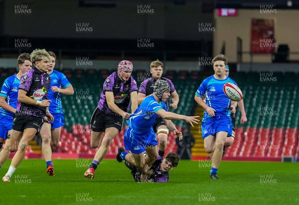 111225 - Ysgol Gymraeg Bro Morgannwg v Ysgol Gyfun Gymraeg Bro Myrddin - U18 Schools and Colleges Champions of Champions - Owen Lewis of Ysgol Gymraeg Bro Morgannwg passes the ball