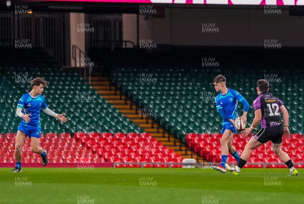 111225 - Ysgol Gymraeg Bro Morgannwg v Ysgol Gyfun Gymraeg Bro Myrddin - U18 Schools and Colleges Champions of Champions - Tomos Williams of Ysgol Gymraeg Bro Morgannwg passes the ball to teammate Rhys Muxworthy