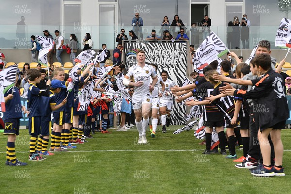 300422 - Zebre Parma v Dragons - United Rugby Championship - Dragons enter the pitch 
