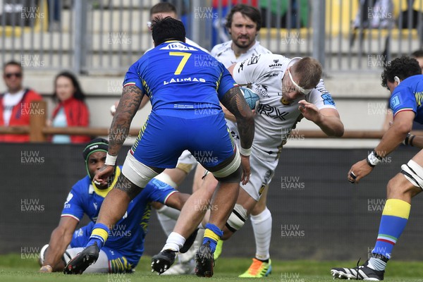 300422 - Zebre Parma v Dragons - United Rugby Championship - Joe Davies of Dragons is tackled by Jimmy Tuivaiti