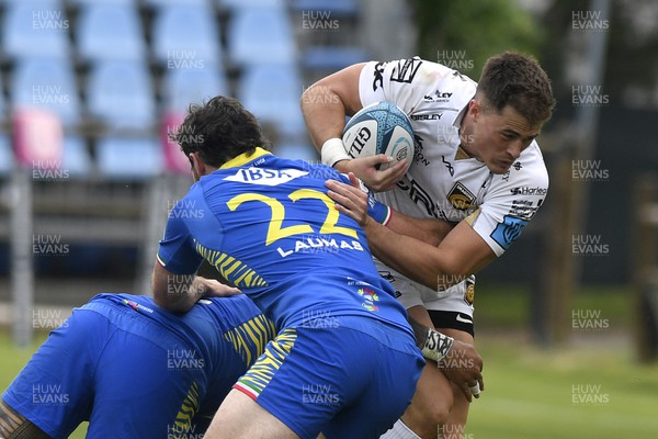 300422 - Zebre Parma v Dragons - United Rugby Championship - Jared Rosser of Dragons is tackled by Tim O'Malley (22)