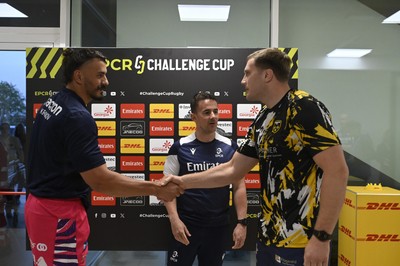 110426 - Zebre Parma v Dragons RFC - EPCR Challenge Cup Quarter Final - Leonardo Krumov of Zebre and Ben Carter of Dragons with referee Luke Pearce for the coin toss