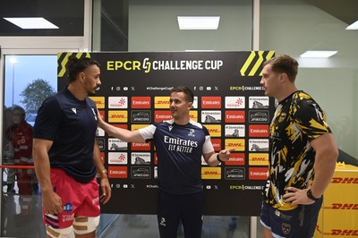 110426 - Zebre Parma v Dragons RFC - EPCR Challenge Cup Quarter Final - Leonardo Krumov of Zebre and Ben Carter of Dragons with referee Luke Pearce for the coin toss