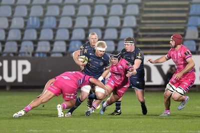 110426 - Zebre Parma v Dragons RFC - EPCR Challenge Cup Quarter Final - Aaron Wainwright of Dragons is tackled by Leonardo Krumov of Zebre 