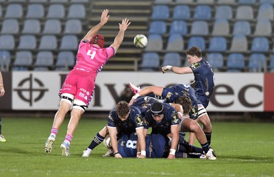 110426 - Zebre Parma v Dragons RFC - EPCR Challenge Cup Quarter Final - Niall Armstrong of Dragons kicks as Matteo Canali of Zebre tries to charge down