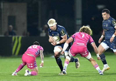 110426 - Zebre Parma v Dragons RFC - EPCR Challenge Cup Quarter Final - Aaron Wainwright of Dragons takes on Giacomo da Re and Bautista Stavile of Zebre 