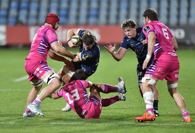 110426 - Zebre Parma v Dragons RFC - EPCR Challenge Cup Quarter Final - Thomas Young of Dragons is tackled by Giulio Bertaccini of Zebre (13)