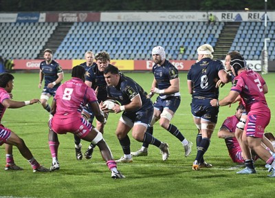 110426 - Zebre Parma v Dragons RFC - EPCR Challenge Cup Quarter Final - Christian Coleman of Dragons takes on Davide Odiase of Zebre 