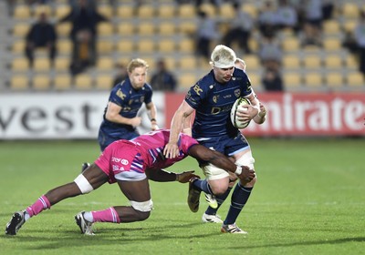 110426 - Zebre Parma v Dragons RFC - EPCR Challenge Cup Quarter Final - Aaron Wainwright of Dragons is tackled by Davide Odiase of Zebre 