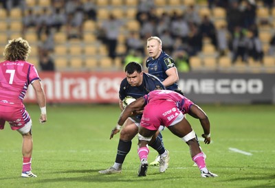 110426 - Zebre Parma v Dragons RFC - EPCR Challenge Cup Quarter Final - Christian Coleman of Dragons is tackled by Davide Odiase of Zebre 