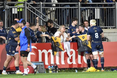 110426 - Zebre Parma v Dragons RFC - EPCR Challenge Cup Quarter Final - Dragons players celebrate their victory with fans