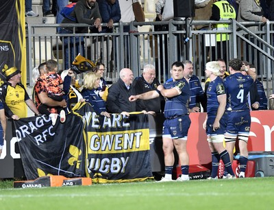 110426 - Zebre Parma v Dragons RFC - EPCR Challenge Cup Quarter Final - Dragons players celebrate their victory with fans