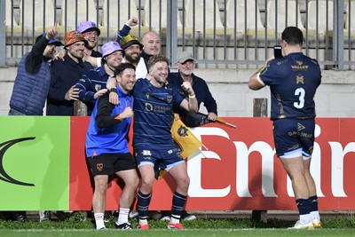 110426 - Zebre Parma v Dragons RFC - EPCR Challenge Cup Quarter Final - Dragons players celebrate their victory with fans
