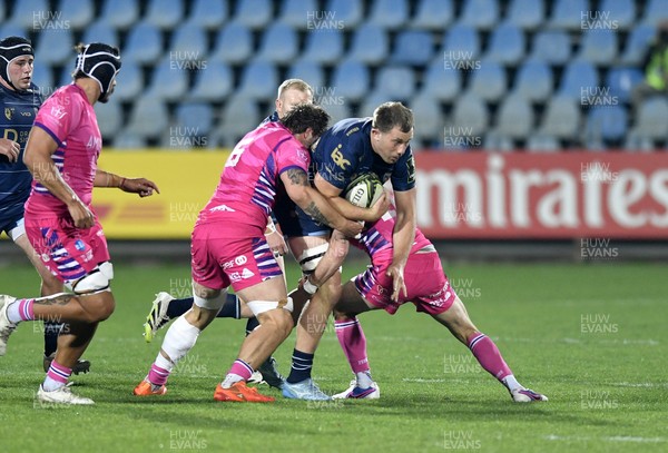 110426 - Zebre Parma v Dragons RFC - EPCR Challenge Cup Quarter Final - Ben Carter of Dragons is tackled by Alessandro Ortombina of Zebre (L)