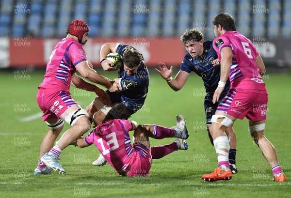 110426 - Zebre Parma v Dragons RFC - EPCR Challenge Cup Quarter Final - Thomas Young of Dragons is tackled by Giulio Bertaccini of Zebre (13)