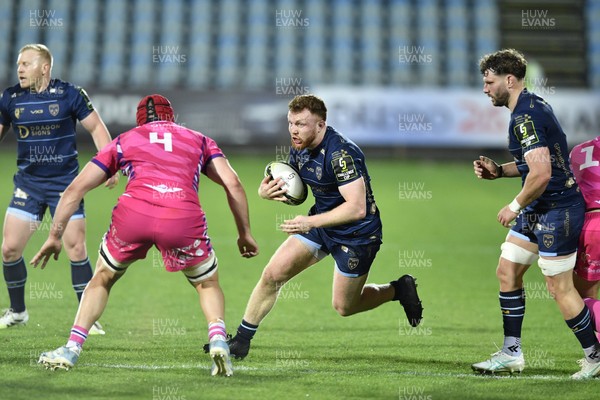 110426 - Zebre Parma v Dragons RFC - EPCR Challenge Cup Quarter Final - Aneurin Owen of Dragons takes on Matteo Canali of Zebre 