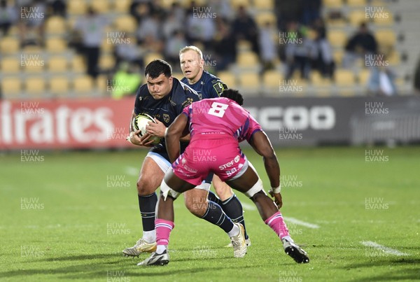 110426 - Zebre Parma v Dragons RFC - EPCR Challenge Cup Quarter Final - Christian Coleman of Dragons is tackled by Davide Odiase of Zebre 