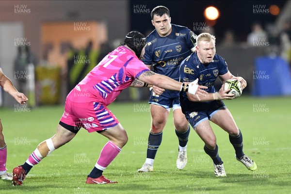 110426 - Zebre Parma v Dragons RFC - EPCR Challenge Cup Quarter Final - Tinus de Beer of Dragons is tackled by Luca Franceschetto of Zebre 