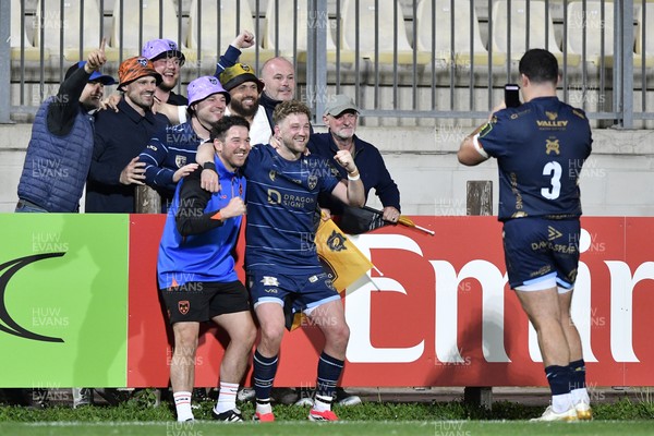 110426 - Zebre Parma v Dragons RFC - EPCR Challenge Cup Quarter Final - Dragons players celebrate their victory with fans