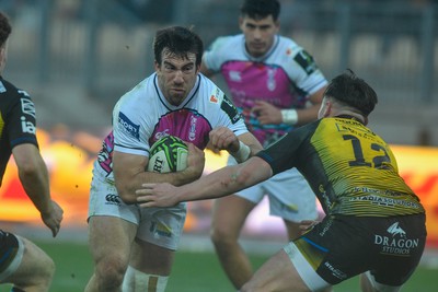 130124 - Zebre Parma v Dragons RFC - EPCR Challenge Cup - Enrico Lucchin of Zebre is tackled by Harri Ackerman of Dragons