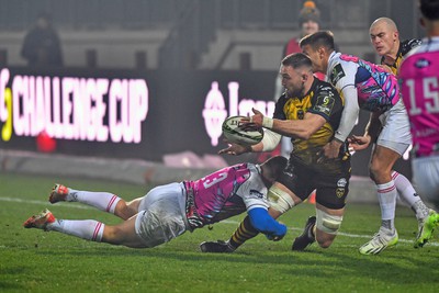 130124 - Zebre Parma v Dragons RFC - EPCR Challenge Cup - Harri Keddie of Dragons is tackled by Luca Morisi 