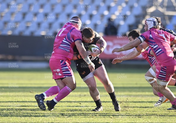 110126 - Zebre Parma v Ospreys - EPCR Challenge Cup - Kian Hire of Ospreys takes on Paolo Buonfiglio of Zebre 