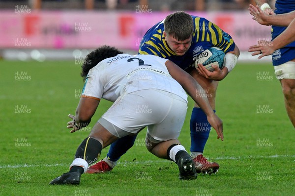 290123 - Zebre Parma v Ospreys - United Rugby Championship - Ion Neculai of Zebre is tackled by Elvis Taione